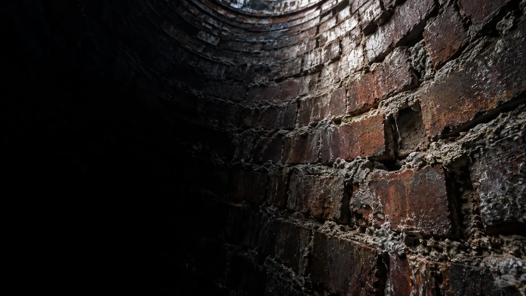 Condition illustration of a curved manhole brick wall with chipped bricks and missing mortar.
