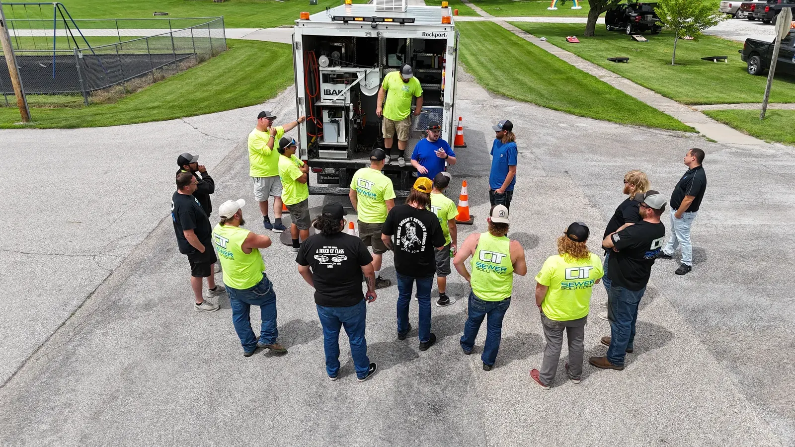 CIT field staff gathered for a group briefing before work begins.