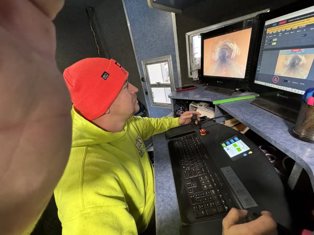 Sewer televising operation documenting pipe conditions for asset management.